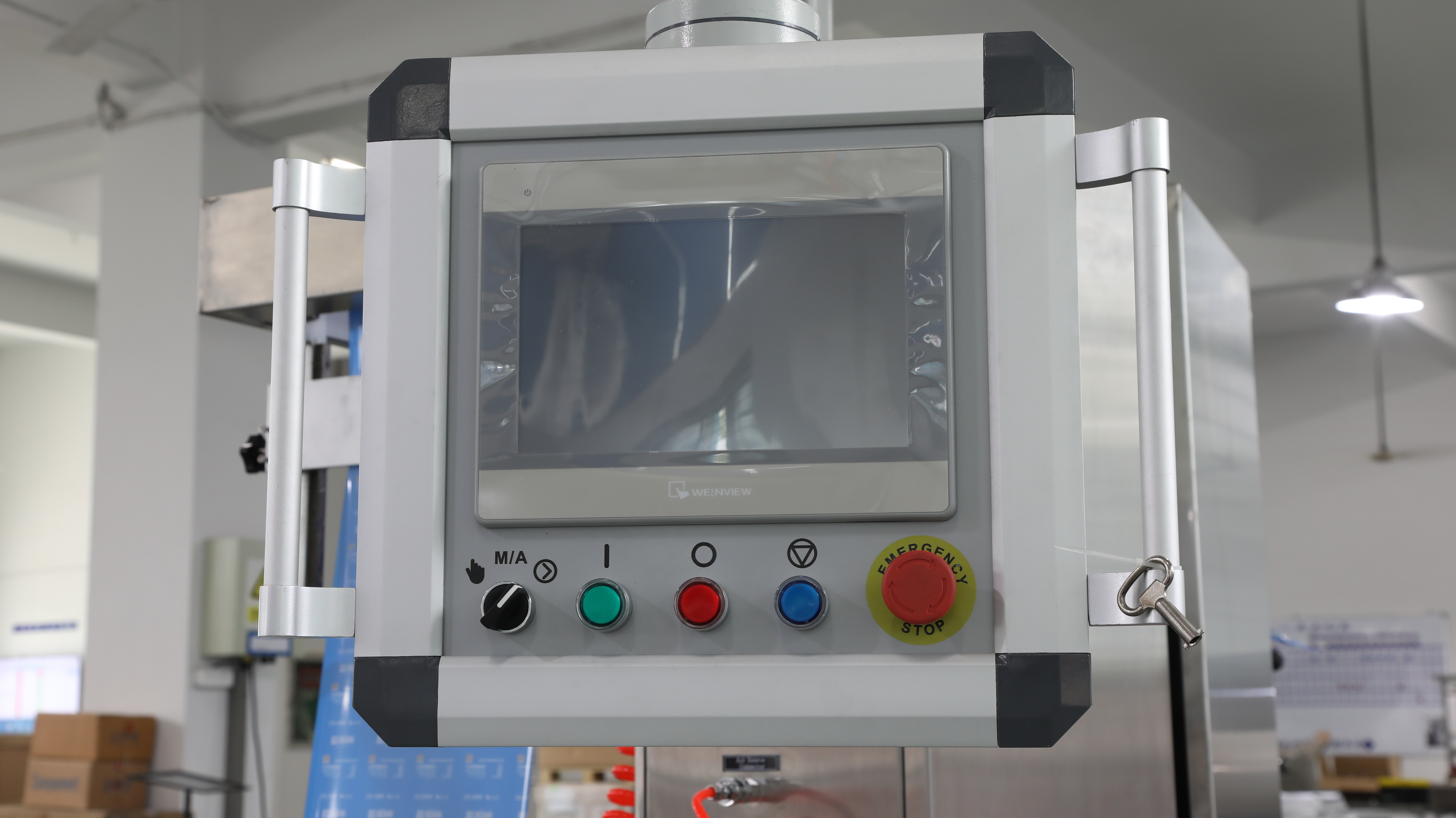 Partial view of Thermoforming packaging machine 