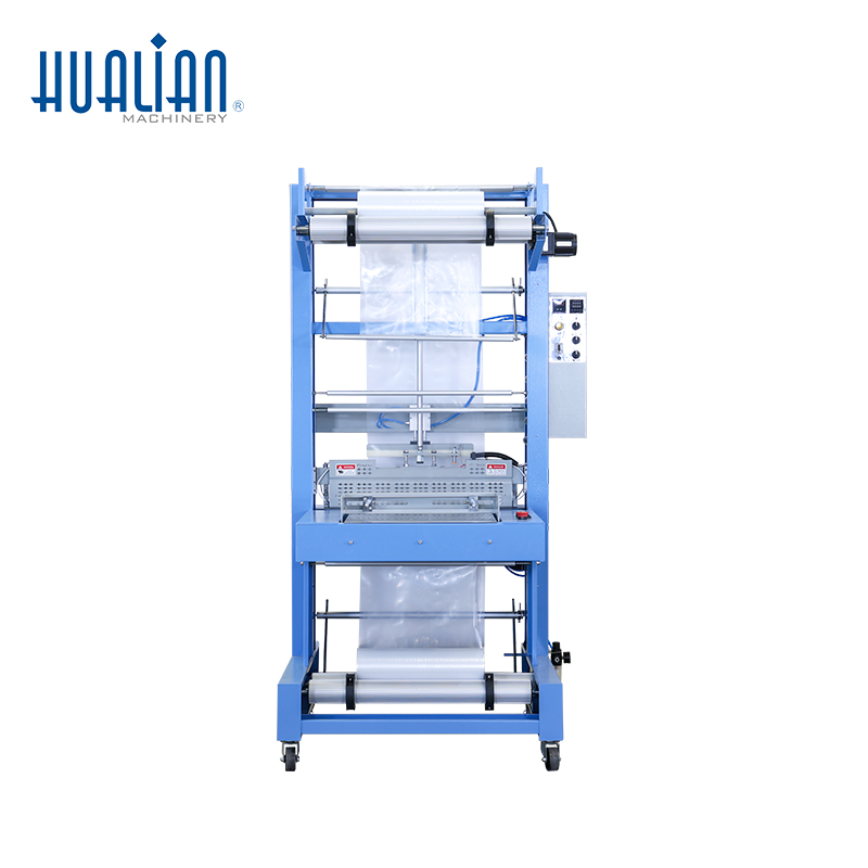 Shrink wrapper machine for bottles