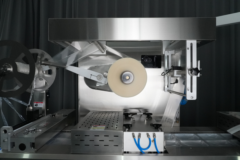 Map thermoforming packaging machine