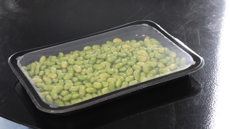 Map tray sealing machine for vegetable